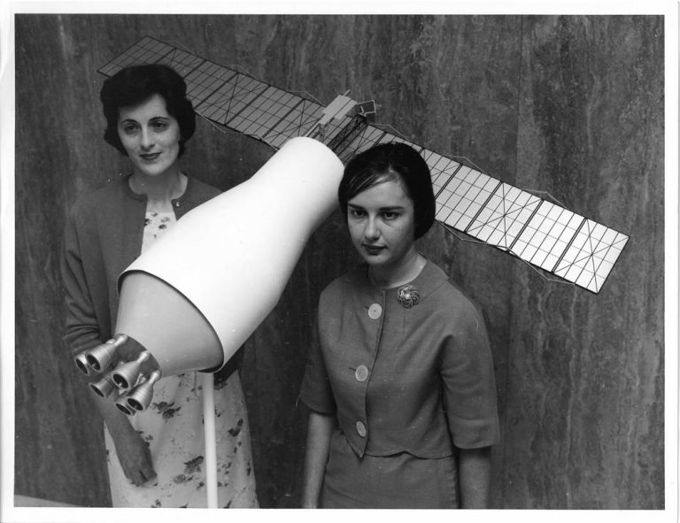 Ann R. McNair and Mary Jo Smith with Model of Pegasus Satellite, July 14, 1964